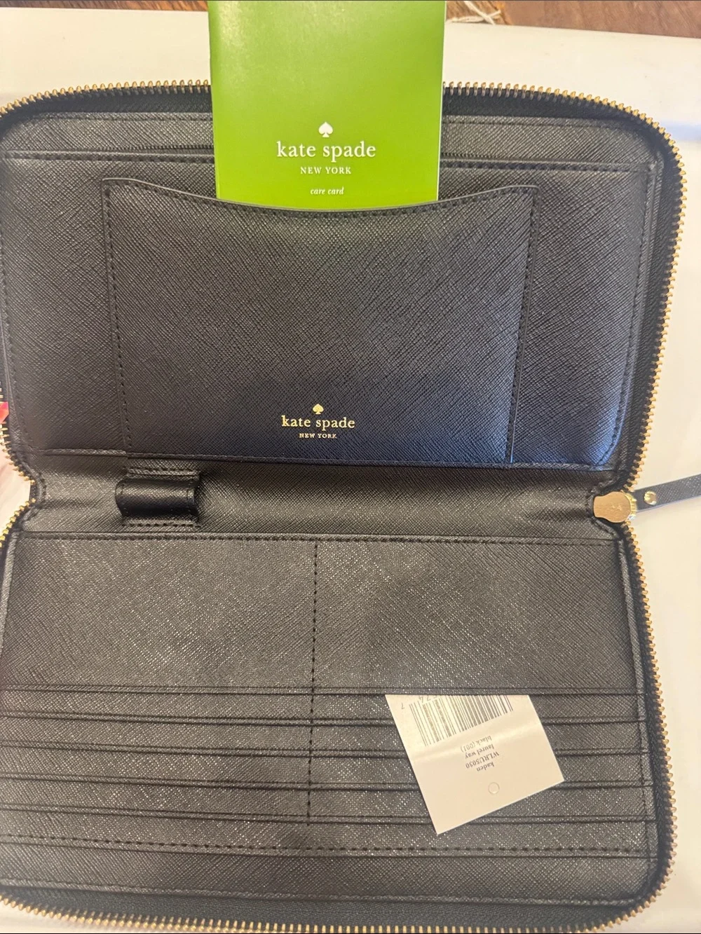 kate spade Black Zip Wristlet Wallet with Gold Accent